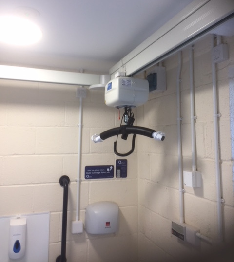 Inside the accessible toilet - the motorised hoist