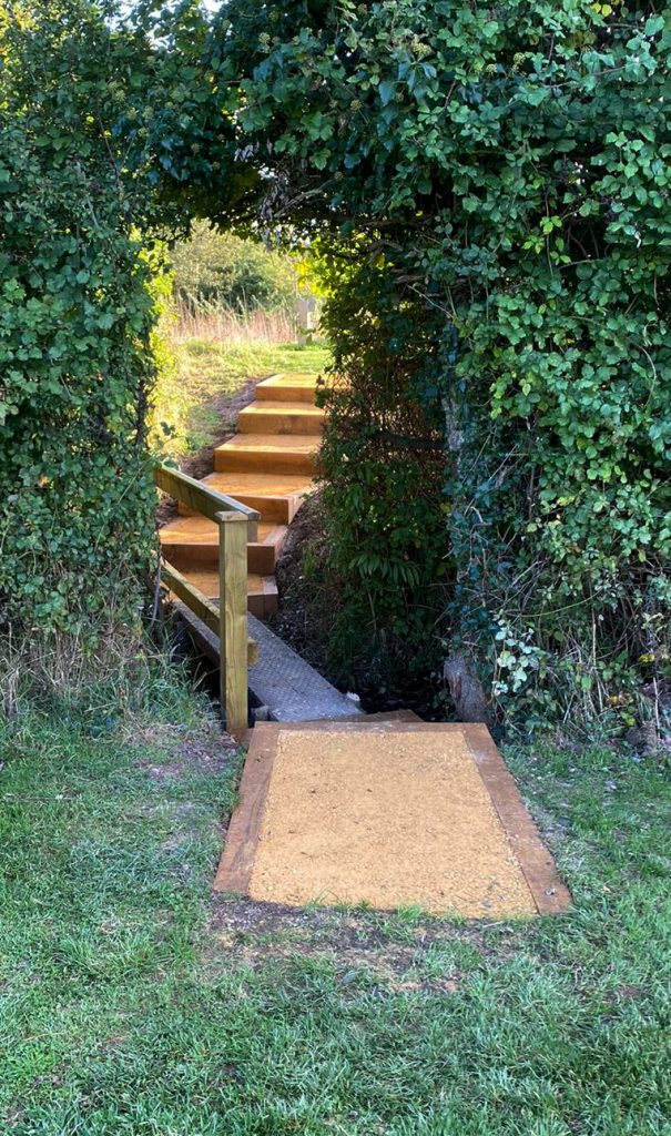 New steps. Bridge in foreground.