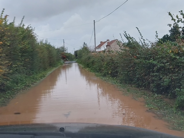 Flooding outside Perrycroft, Perry Green